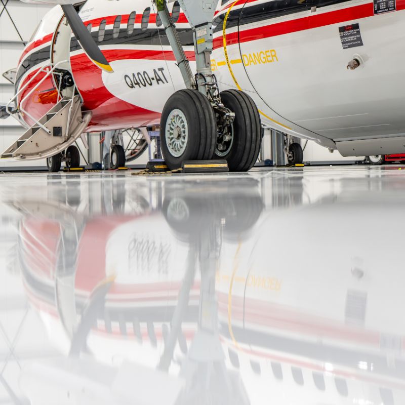 airport-hangars-industrial-flooring-northwest-arkansas Industrial hangar floors Northwest Arkansas. Pace X Concrete Coatings.